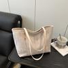 This year, the popular tote bag women's large-capacity 2025 new simple and cute pendant texture commuting shoulder bag