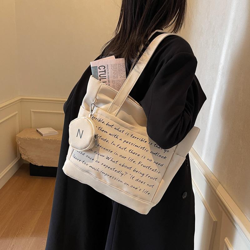 Damen Umhängetasche 2025 neuer Wintertrend Große Kapazität Einfarbige Handtasche Einfach Mode Buchstabentasche