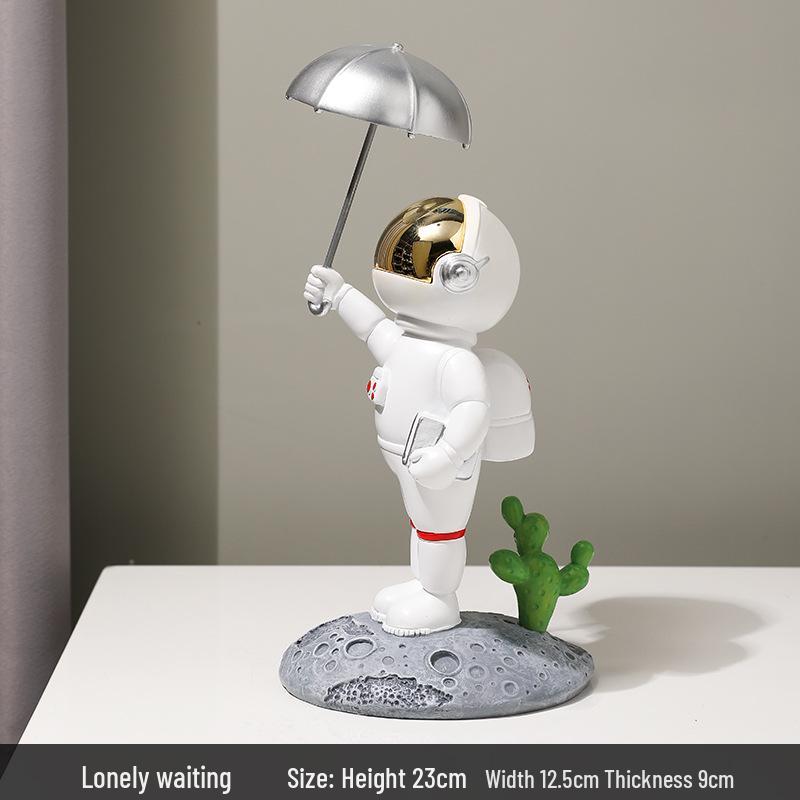 

Electroplated Astronaut Ornament: Handmade Desktop Decor for Home and Office.