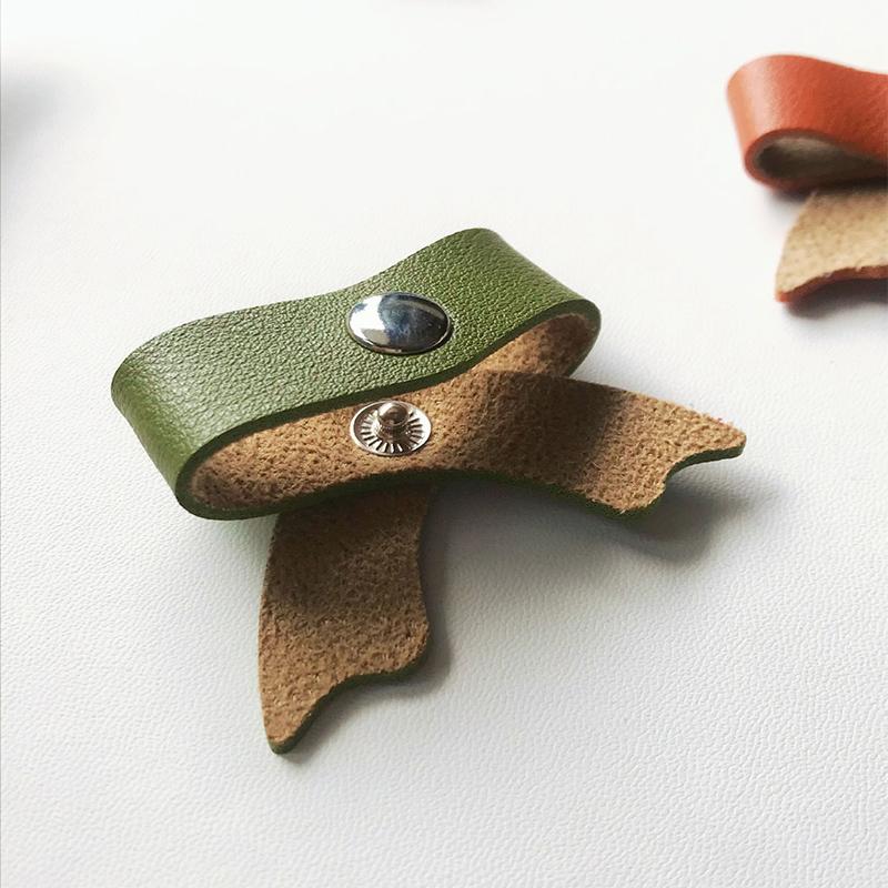 1 Stück PU Leder Schleife Datenkabel Organizer Kabelaufwickler Riemen Kopfhörer Wickler Aufwickler Ordentliche Aufbewahrung Kabelhalter Clips Binder