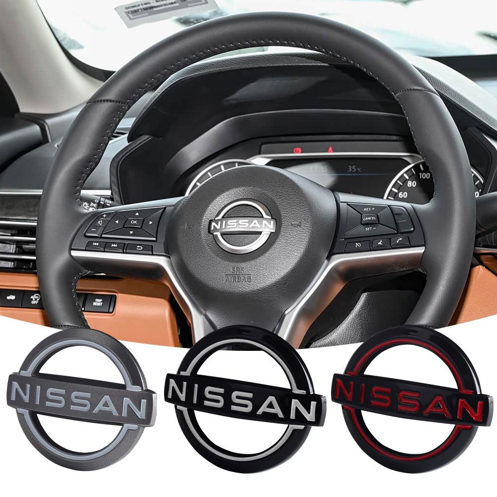 AOK3 1 Pezzo ABS Adesivi Emblema Logo Centrale Volante Auto Per Nissan Nismo Xtrail Sentra Qashqai Note Leaf Juke Rogue Almera Sylphy
