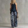 Completo due pezzi con top senza maniche con scollo all'americana, dettaglio a balze e pantaloni a gamba larga sfumati