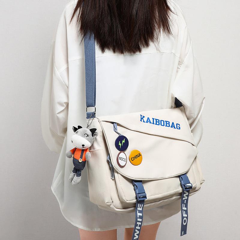 

Super Fire Foreign Style Niche Cloth Bag Women S Japanese Versatile Large-Capacity Student Shoulder Messenger Bag білий