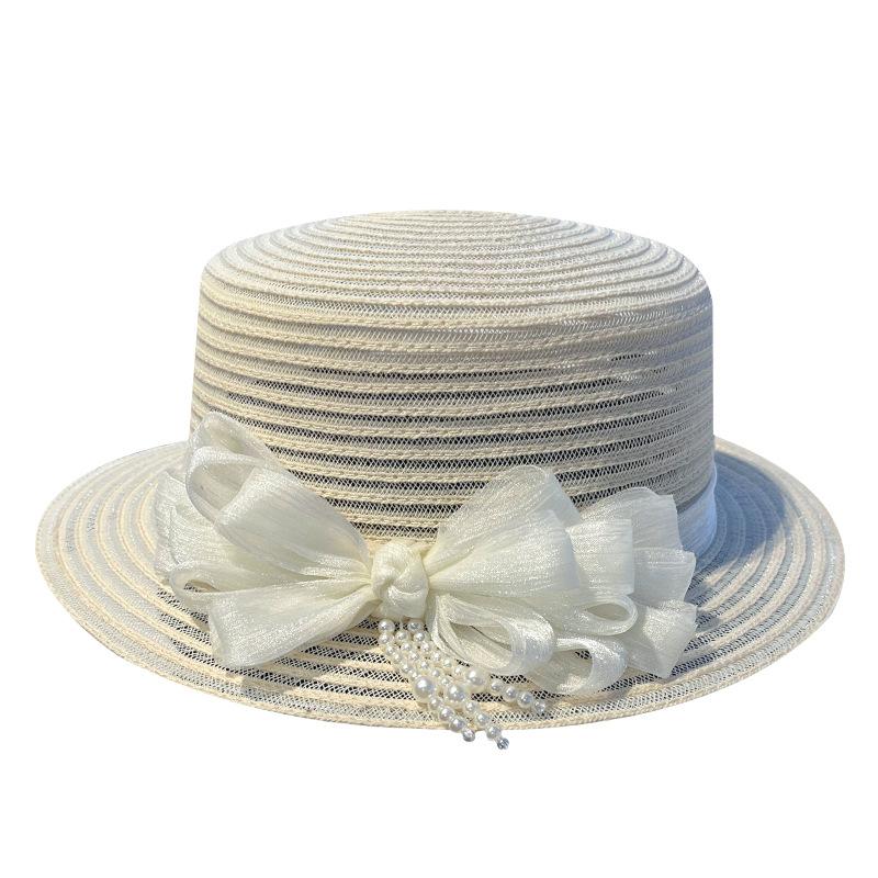 New bow pearl decoration women's summer face covering sunscreen straw hat British retro sunshade fashionable and elegant mesh gauze hat