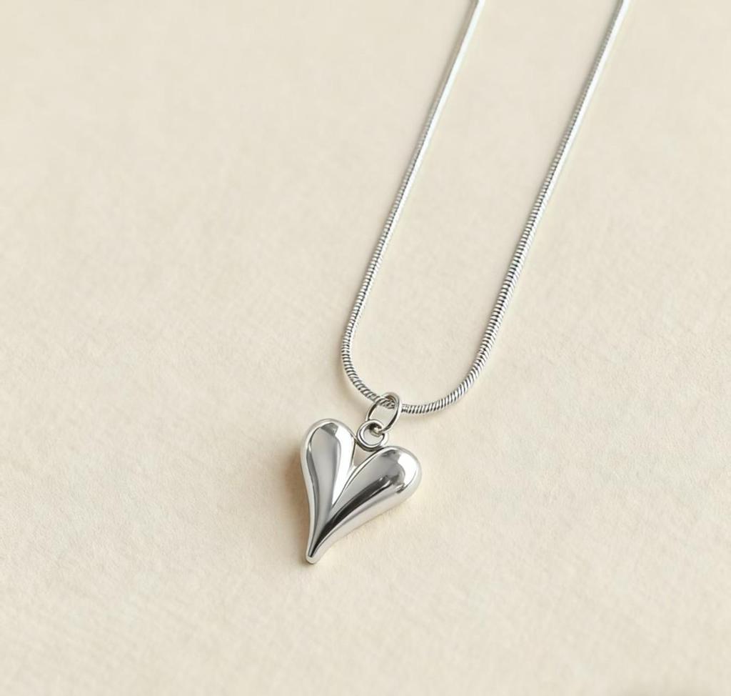 Elegant Double-Layer Heart Pendant Necklace: European & American Design, Fashionable Clavicle and Snake Chain for Women