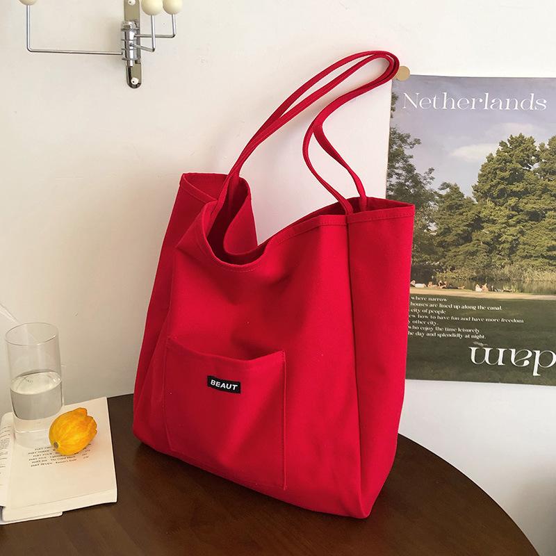 Large-capacity shoulder bag women's nylon versatile portable leisure student class tote bag bag cloth bag lazy wind