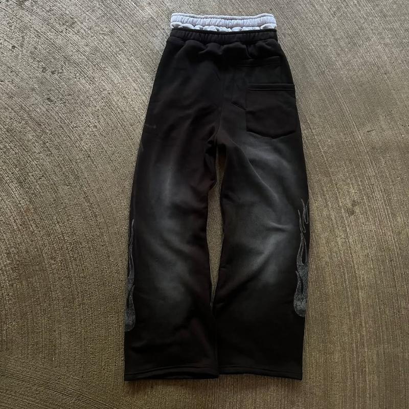 Tendência de rua europeia e americana masculina e feminina solta casual tubo reto tecido bordado calças estampadas