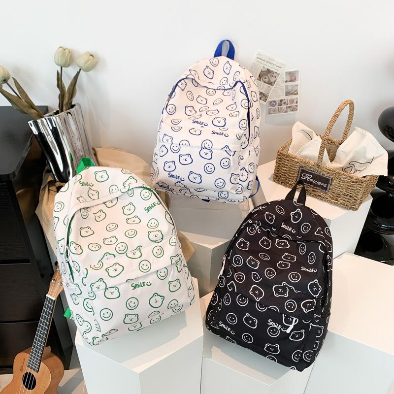 Schoolbag Korean version small fresh backpack 1011 summer graffiti junior high school boys and girls campus schoolbag cartoon print backpack