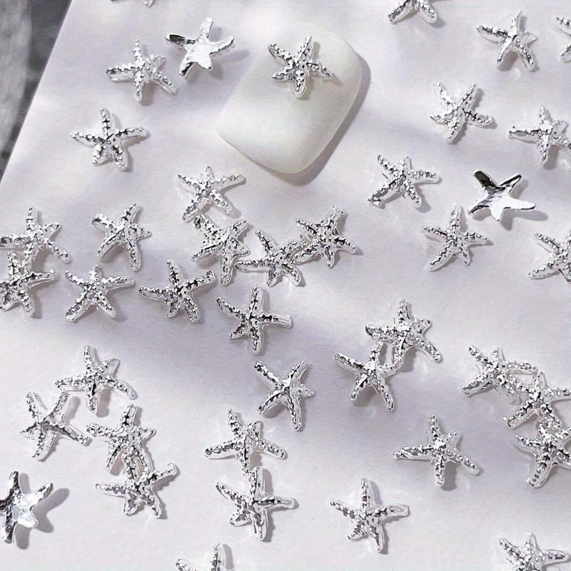 Goldene Seestern-Nagelanhänger Meeresstil Glitzernde Strasssteine Stern-Nagelkunst-Dekorationen Frühling Sommer 10 Stück 3D-Legierung DIY-Nagelsteine Geschenk für Mädchen