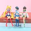 12CM Anime Sailor Moon Action Figure Beautiful Girl Water Ice Moon Pluto Yellow Hair Kawaii Sitting Collectible Model Toy