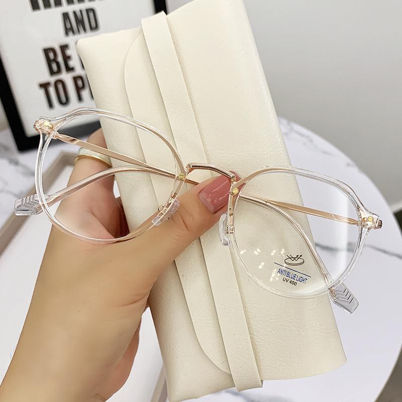 A Woman With A Big Face Wearing Glasses And Having Myopia Is Protecting Herself From Blue Light.