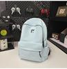School bag Korean version couple simple large-capacity backpack leisure commuting college student school bag niche light travel backpack