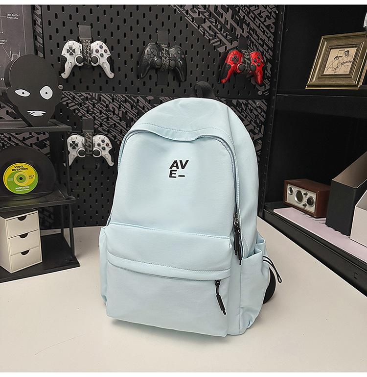 School bag Korean version couple simple large-capacity backpack leisure commuting college student school bag niche light travel backpack