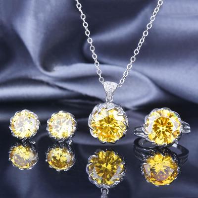 New 7.5 Carat Diamond Lotus Set: Brilliant Yellow Diamond Pendant, Paraiba Green Diamond Stud Earrings, and Color Gem Ring.