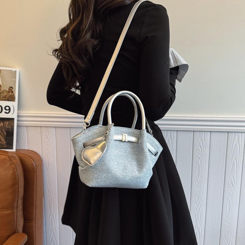 Korean senior sense of bucket shape soft and durable fashion exquisite new light luxury commuting slanting cross shoulder handbag