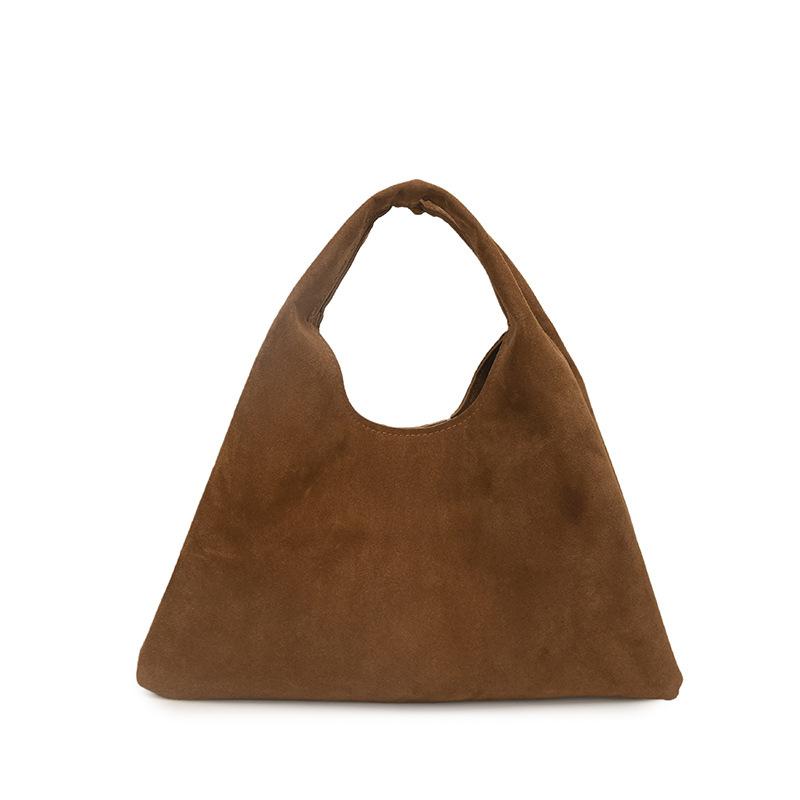 This Handbag Exudes A Sense of Sophistication and Simplicity. It's A Versatile Commuting Bag That Can Be Carried Out with Ease