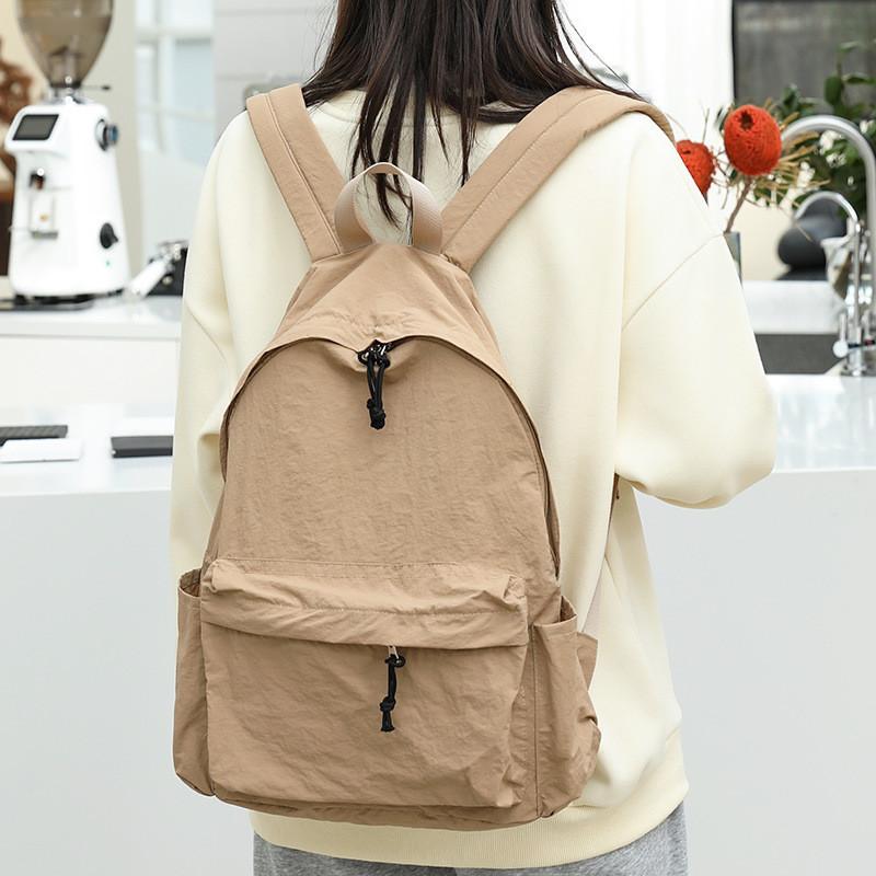 IELGY Japanese casual literary canvas schoolbag, simple washing water and old backpack, khaki fashion nylon backpack.