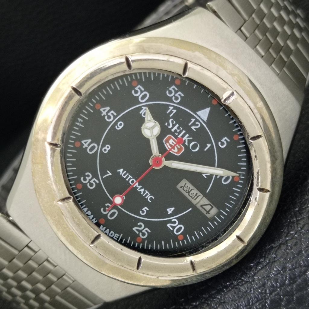 

GENUINE VINTAGE SEIKO 5 AUTOMATIC 7019A JAPAN MENS BLACK DIAL WATCH a702413-5 R124-a702413