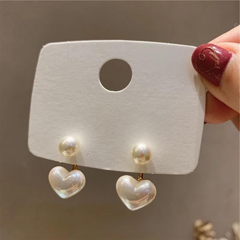 

Новые модные серьги с жемчугом в форме сердца, изящные серьги-подвески Joker Sweet Elegant Temperament для женщин слоновая кость