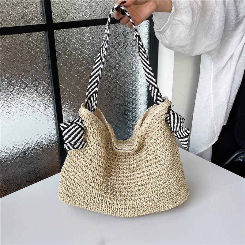 Holiday Style Straw Woven Bag: Large Capacity, Trendy Single Shoulder with Personalized Strap for Women