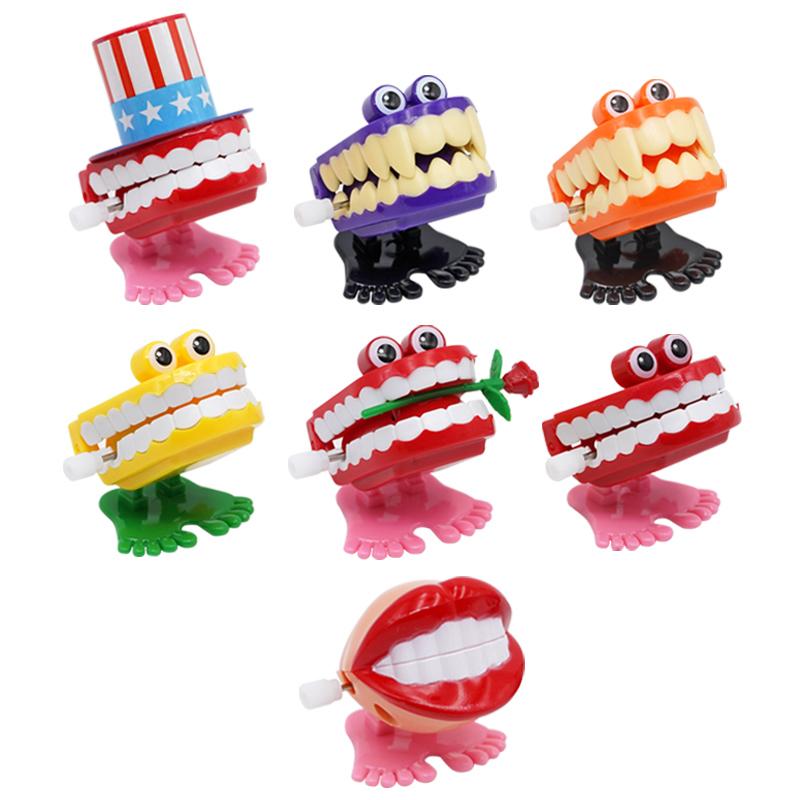 5Pcs Children Gifts Tooth Shape Mini Clockwork Jumping Toy Funny Cute Jump Teeth Denture Educational Toys Spring Wind Up Toy