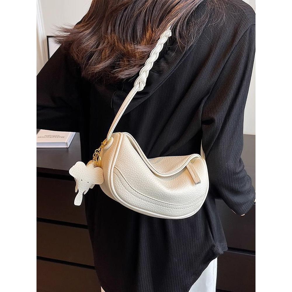 High-value French niche bag women's new shoulder messenger bag popular niche versatile saddle dumpling bag