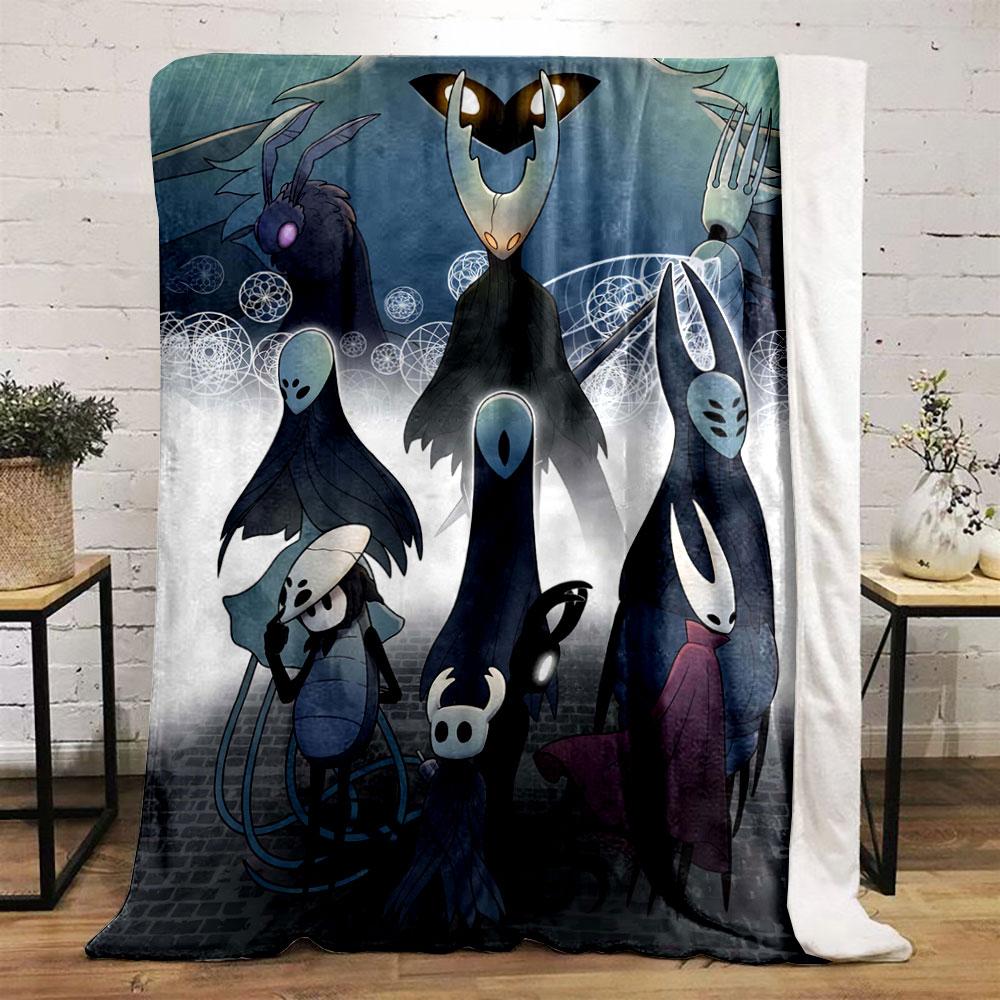 The pattern depicts dark, stylized insect-like characters in a mystical scene. for all seasons blanket lunch break throw gift