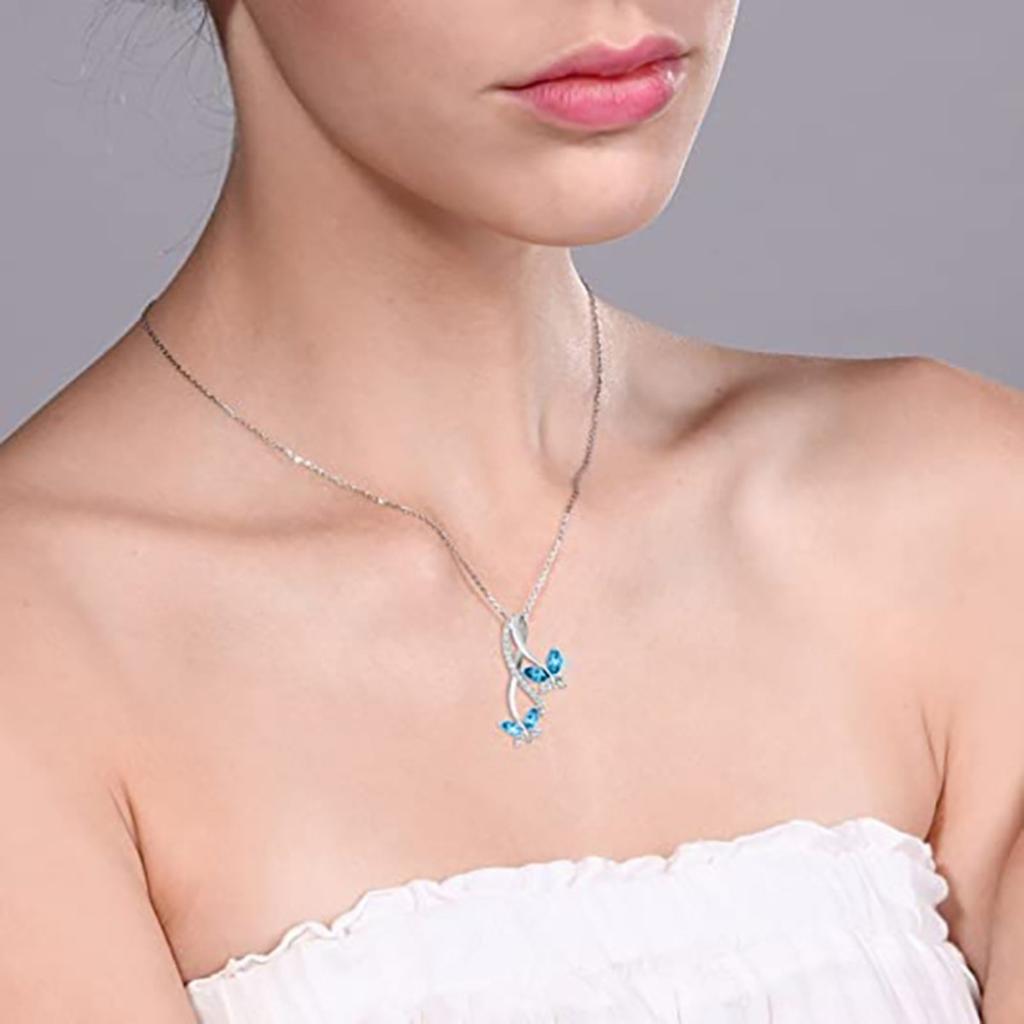 Blue Marquise Butterfly Pendant Necklace with Sparkling Accent Stones and Twisted Curve Design Elegant Jewelry for Women