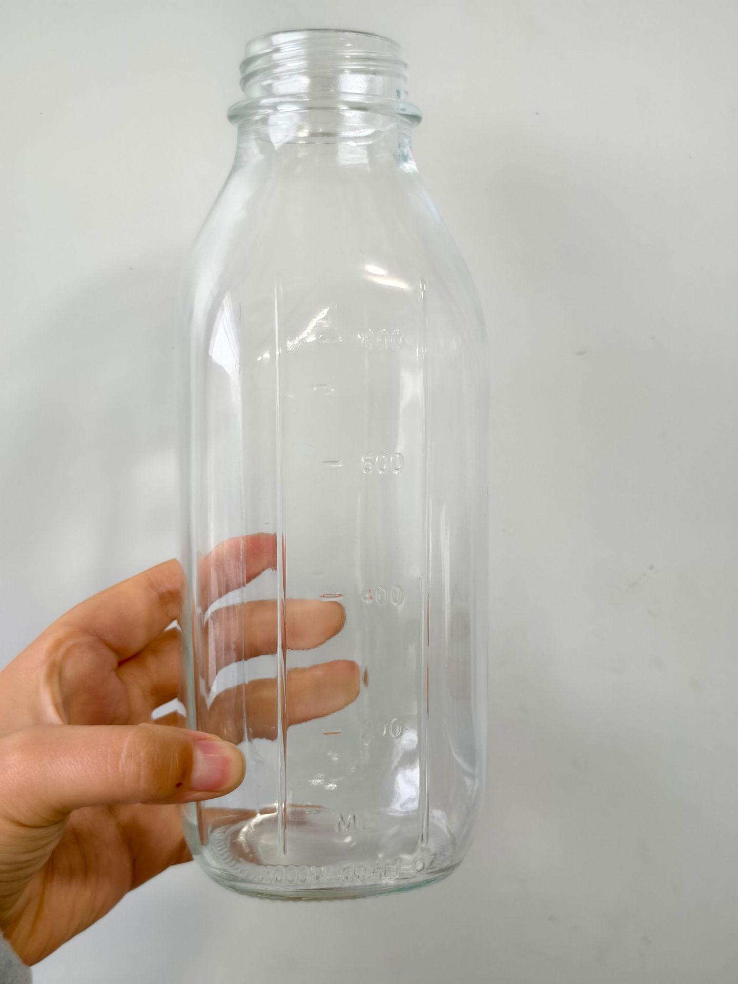 

1000ml Graduated Glass Bottle for Milk, Coffee, Smoothie, Juice, Cold Brew - Food-Grade with Sealed Lid