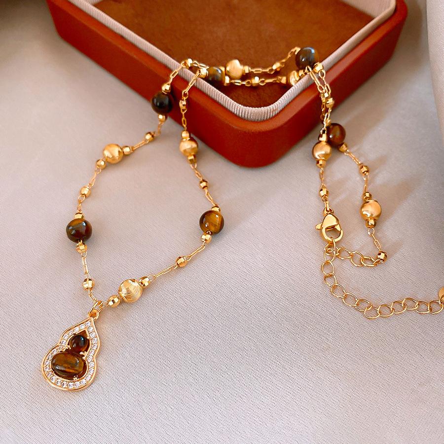 Vintage Maillard style zircon gourd tiger s eye stone necklace accessories women s sweater chain light luxury items