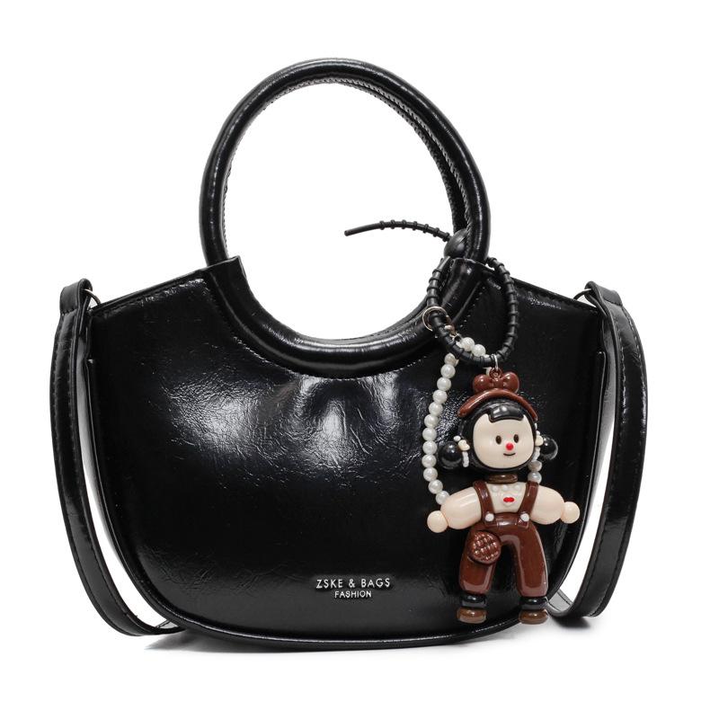 2025 fashion new design casual oil wax leather portable bucket bag simple and versatile solid color temperament messenger women's bag