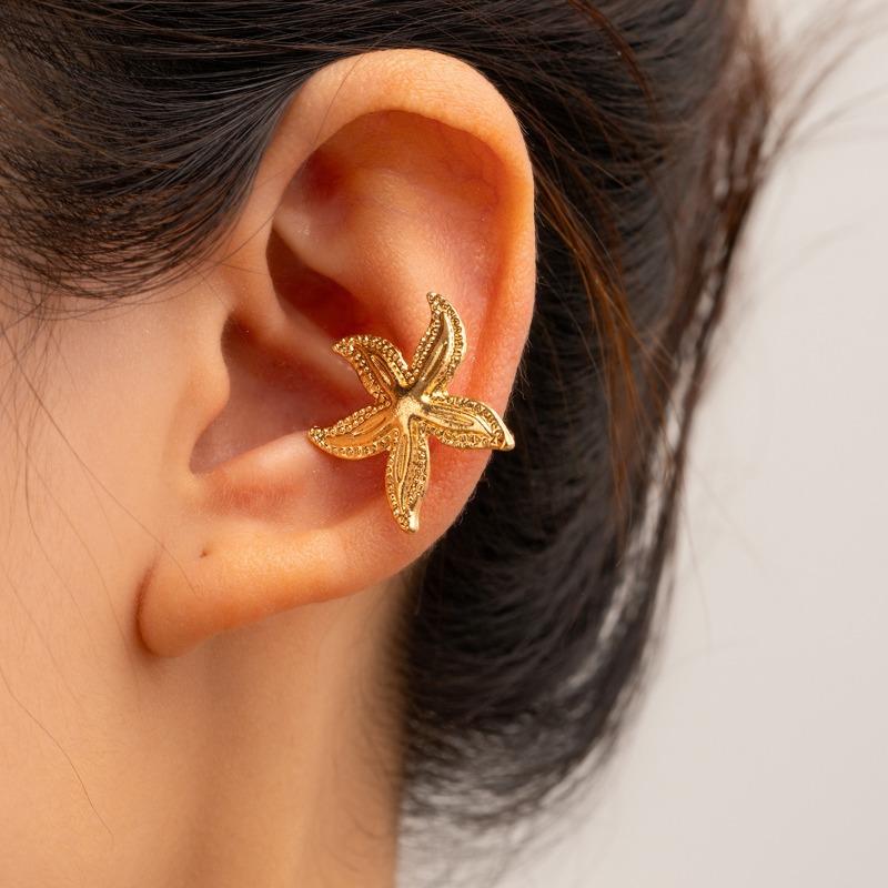 Gold earrings, new alloy jewelry, niche light luxury starfish earrings, women's earbone clips.