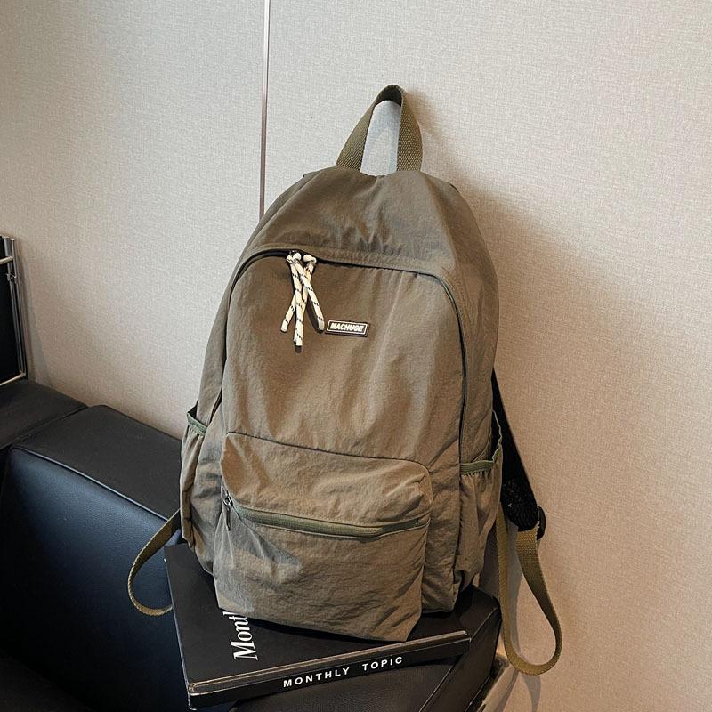 Simple and fashionable large-capacity backpack 2025 new leisure niche college class schoolbag women's solid color backpack