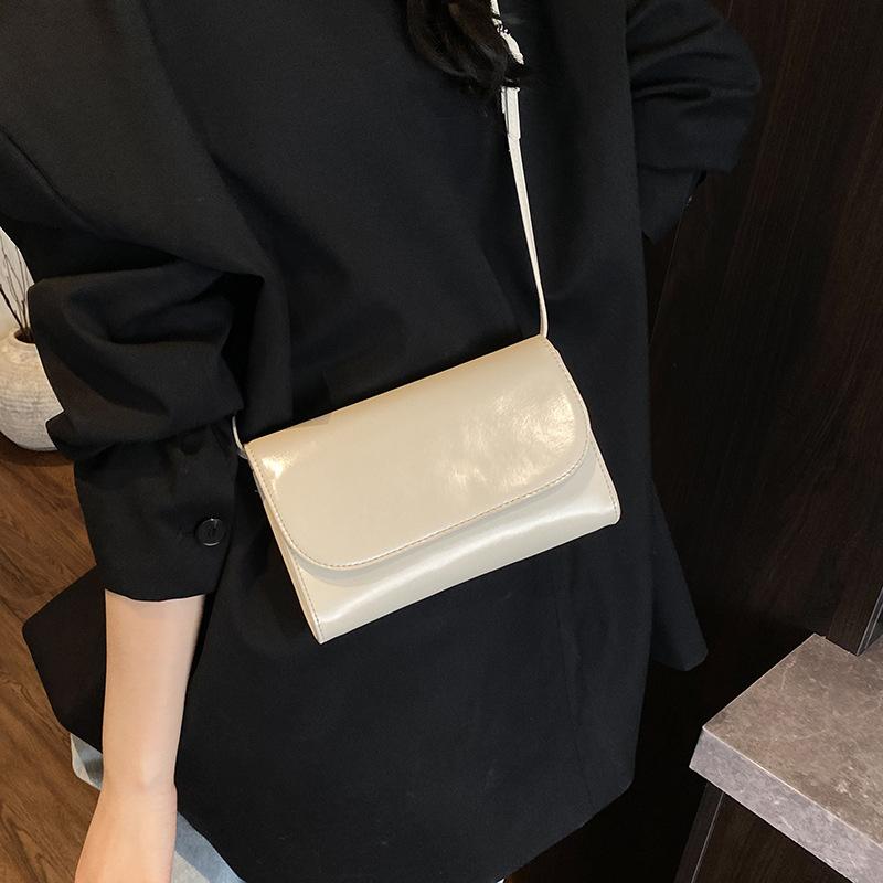 Frühling und Sommer neue strukturierte Tasche Damen Umhängetasche kleine quadratische Tasche Pendeln einfarbig Damen Schulter kleine Tasche