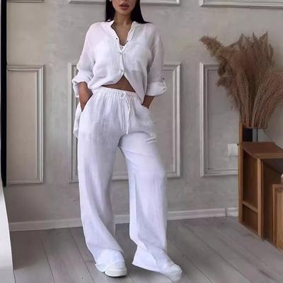 Conjunto de camisa de algodón y lino informal europeo y americano 2025 y pantalón ancho con cordón ajustable.