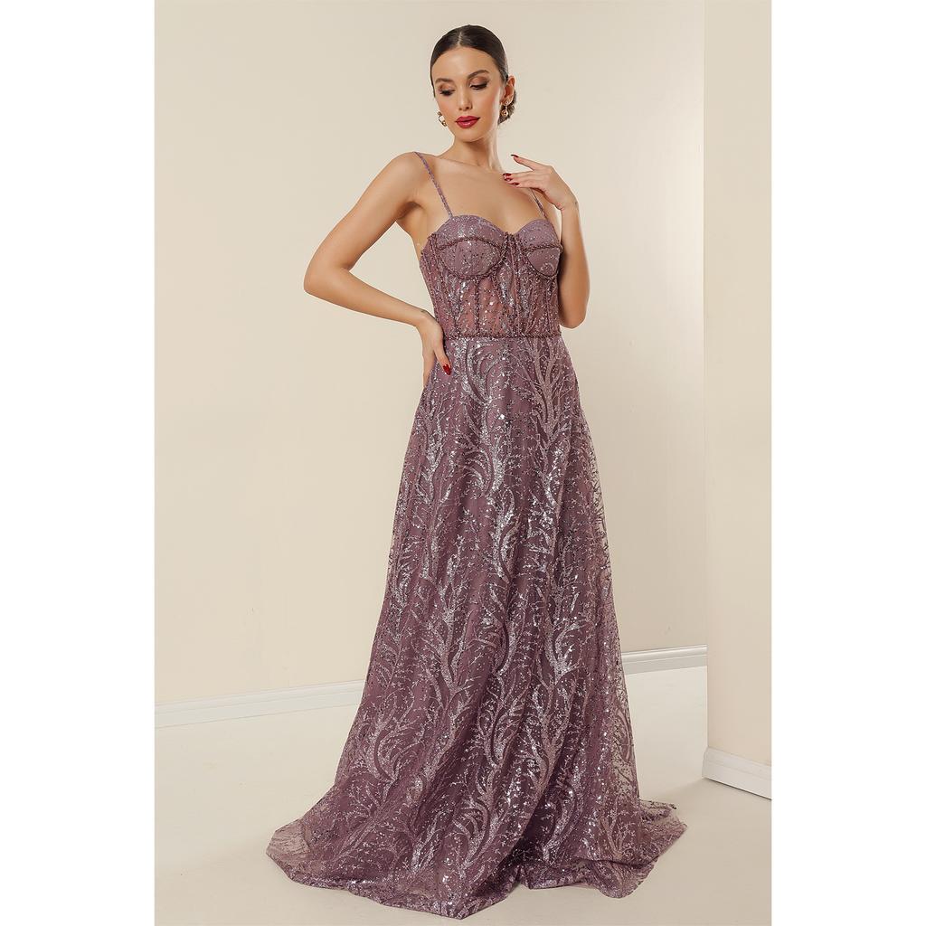 Langes Kleid mit Seilriemen und Perlen, gefüttert mit Pailletten und Glitzerbügeln