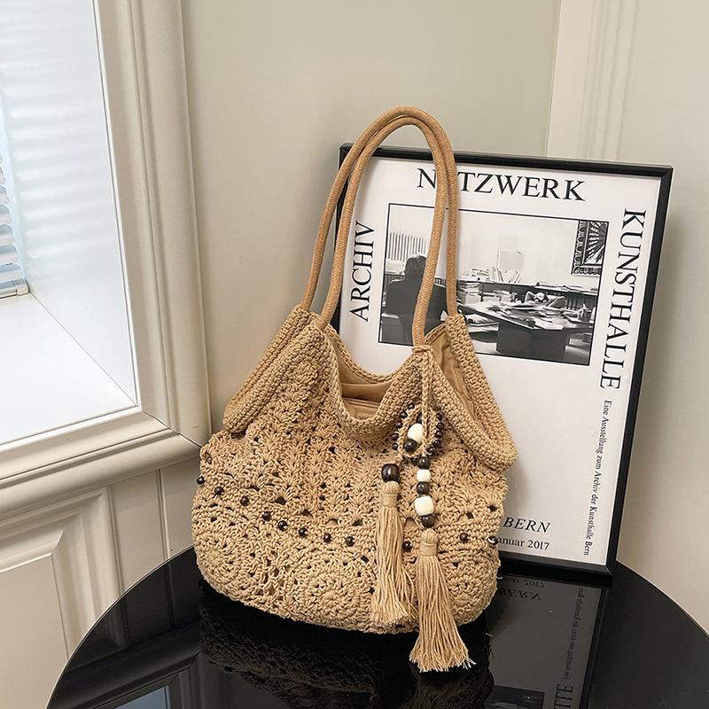 

Tassel woven bag tote bag women s summer new niche hollow cotton bag casual shoulder bag handbag хаки