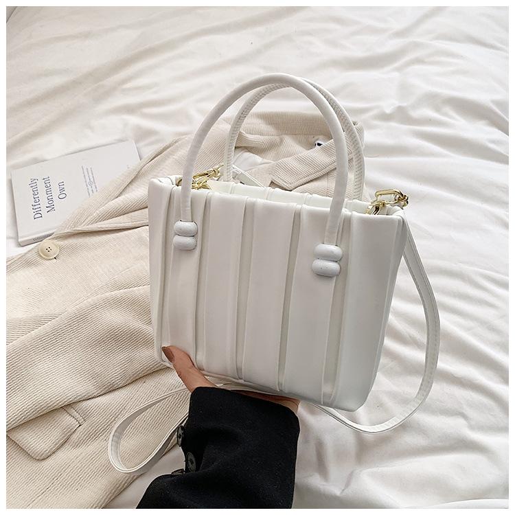 Korean version ins solid color pleated handbag bag women's 2025 autumn new foreign style casual one shoulder messenger tote bag