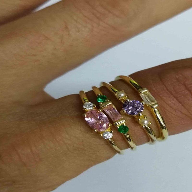 Fashionable 4 In 1 Set Of Gold Plated Rings With Sparkling Zircon Gemstones