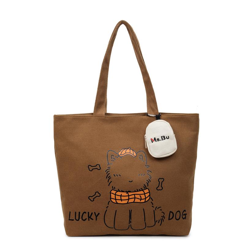 Casual large-capacity canvas bag women's 2025 new lightweight niche commuter shoulder bag graffiti portable tote bag