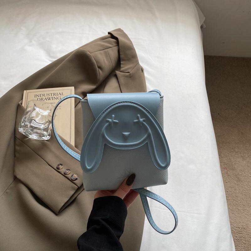 

vertical bag women s bag niche design cute cartoon contrasting color mobile phone bag fashion messenger bag синій