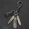 Distinctive Feather Keychain Charm In Antique Silver With Turquoise for Individualistic Fashion Statements Pieces