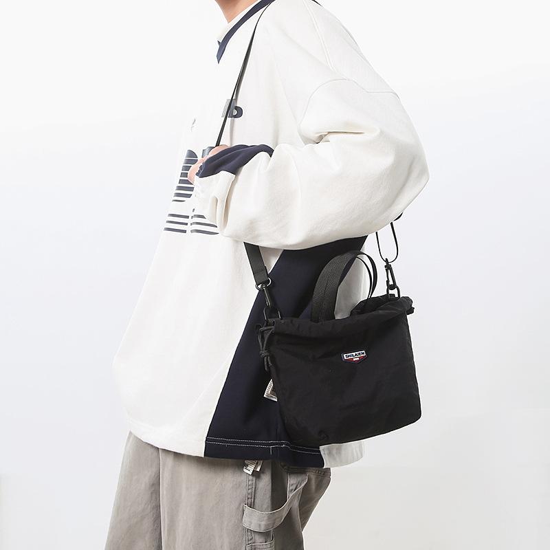 Japanese casual oblique span bag 2025 new Korean version fashionable versatile commuter sports small bag tooling shoulder bucket bag