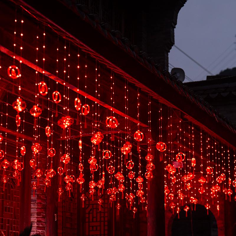 Spring Festival LED Red Lantern Ornaments: Solar Fu Character Colored String Lights for New Year Balcony Decor.