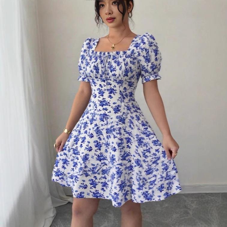 Europäische und amerikanische Damenbekleidung beliebter Blumenprint Lotusblatt-Ärmel Strandurlaubskleid