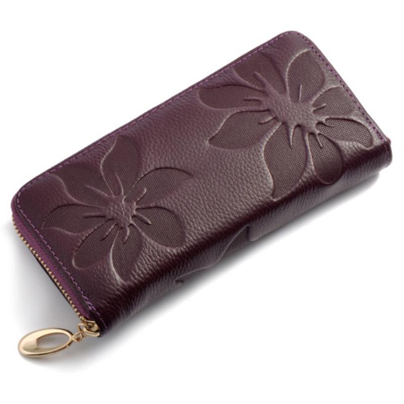 

The first layer of cowhide women s wallet, a long handbag, and a genuine leather women s wallet for Guangzhou direct sales. фиолетовый