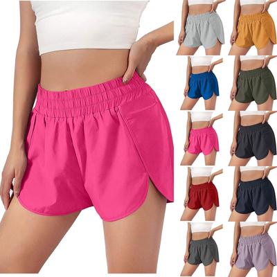 Pantalones cortos de yoga de secado rápido con cintura elástica y movimiento de color sólido para mujer