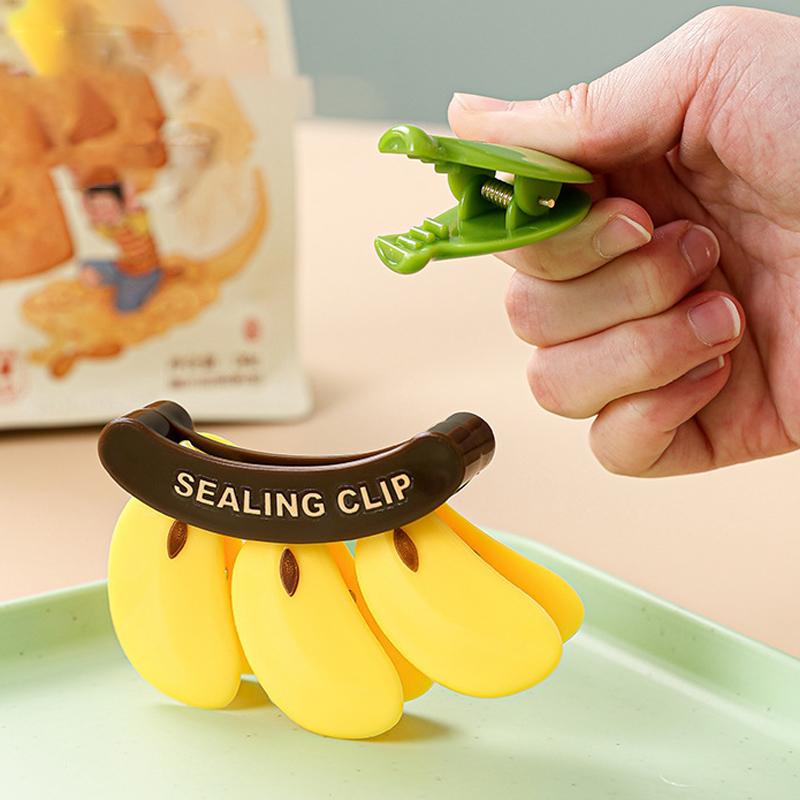 Kunststoff Bananen Magnetverschluss Feuchtigkeitsdicht Handpresse Frischhalteclip Multifunktionaler Haushalts-Lebensmittelbeutelclip