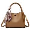 This Bucket Bag Is A Simple and Fashionable Urban Design with A Lychee Pattern and A Silk Scarf. It Is A Hand-held Shoulder Bag