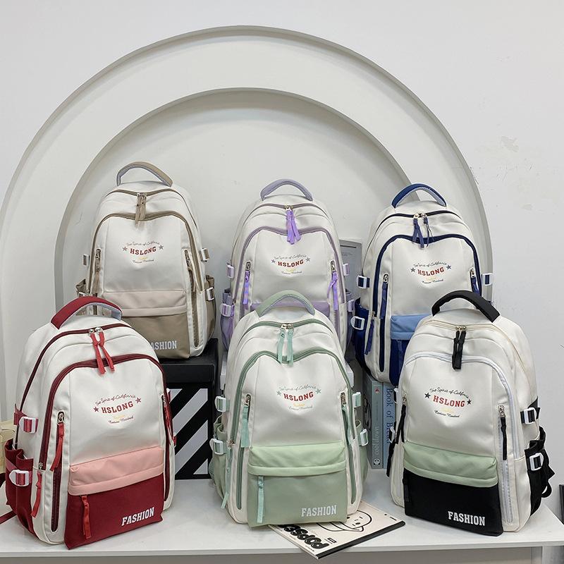 High-value schoolbag female college students contrasting large-capacity backpack junior high school students simple casual computer backpack tide